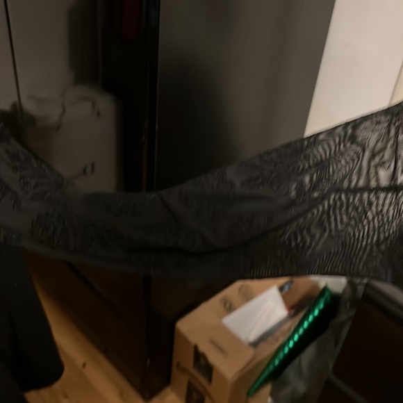 Black fuzzy top that curves in at waist then bells out to bottom w/sheer sleeves - Picture 4 of 5